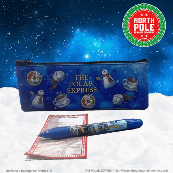 Polar Express pencil case, pen, and notepad in the snow