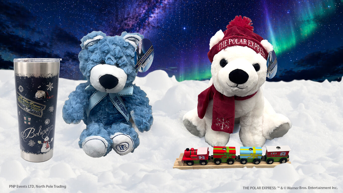 Banner with red travel cup, beanie polar bear, and train in snowy scene.